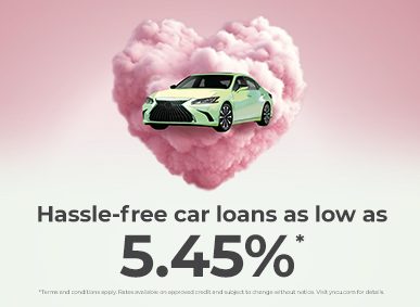 green car floating in front of a pink heart made of clouds
